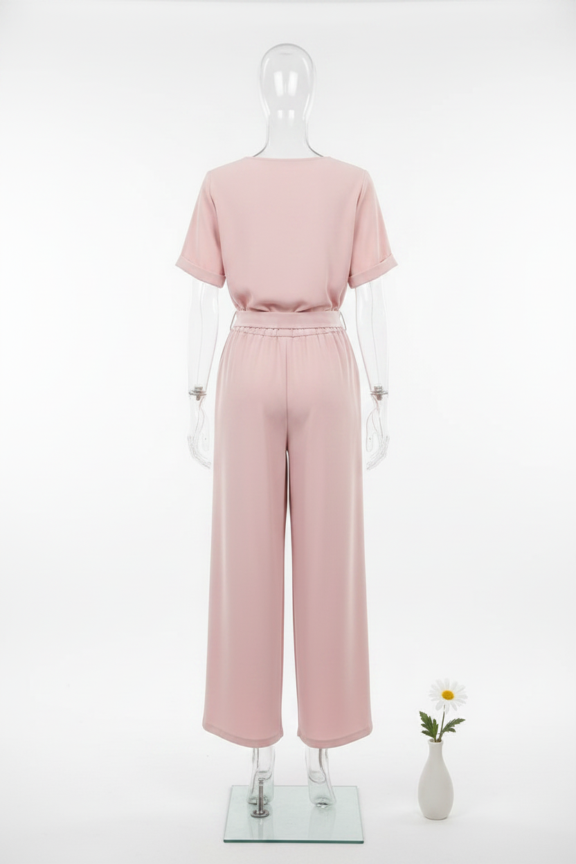 Elegancki komplet damski – bluzka z różą i spodnie wide leg